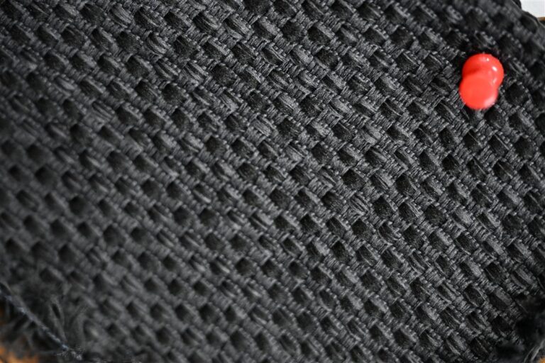 Detailed close-up of intricately woven premium tweed fabric showcasing the artisan yarn texture aligned with Fursone's Chanel-style bouclé fabric manufacturing expertise. This image represents our ready stock and custom bespoke 100m to 1000m fabric solutions for luxury fashion brands sourcing from Wenzhou textile manufacturers.