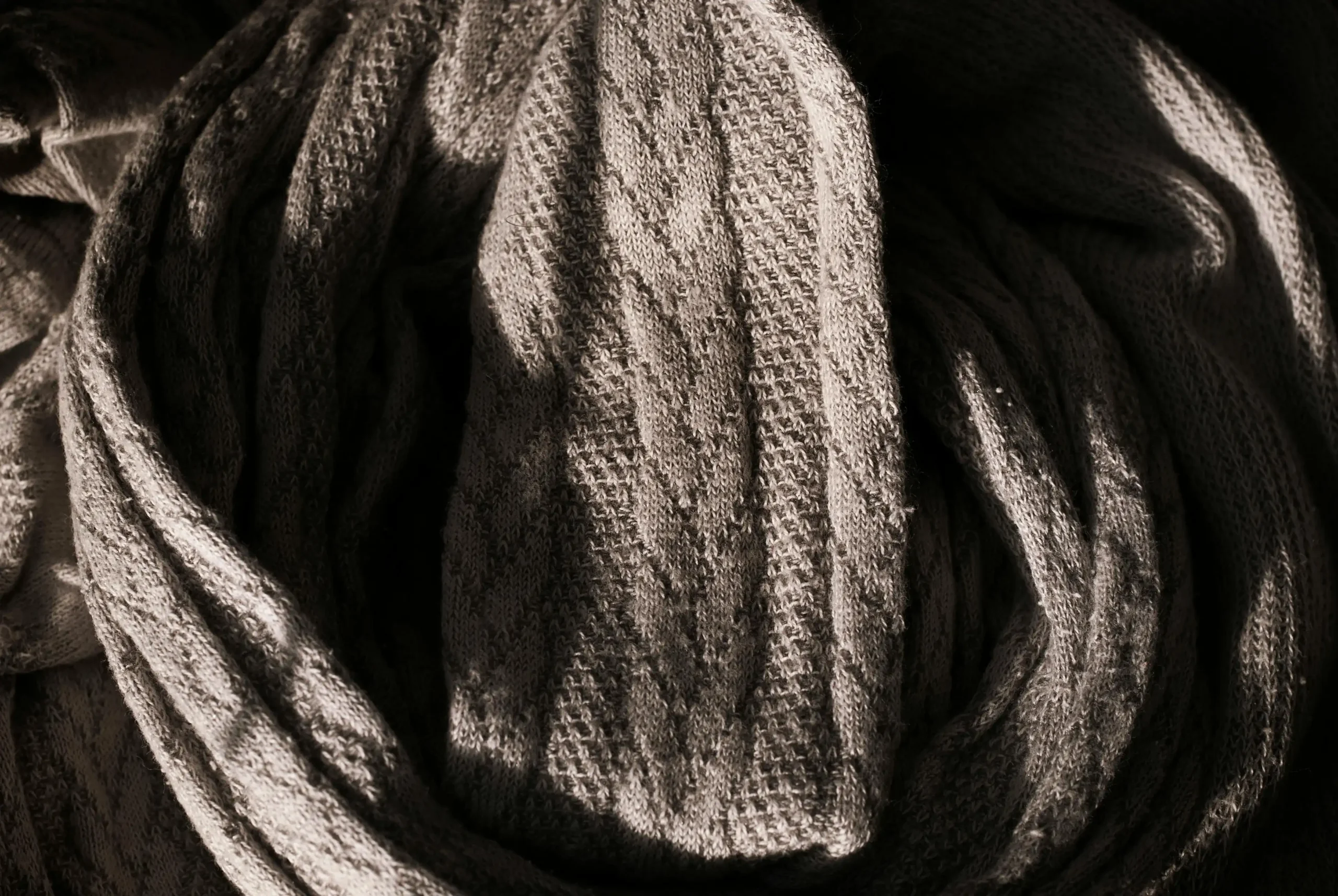 Close-up of Chanel-Style Bouclé Fabric knit texture with boucle loops and cable detail. It showcases Fursone's Wenzhou textile expertise in luxury tweed and knit fabrics for ready stock and bespoke development.