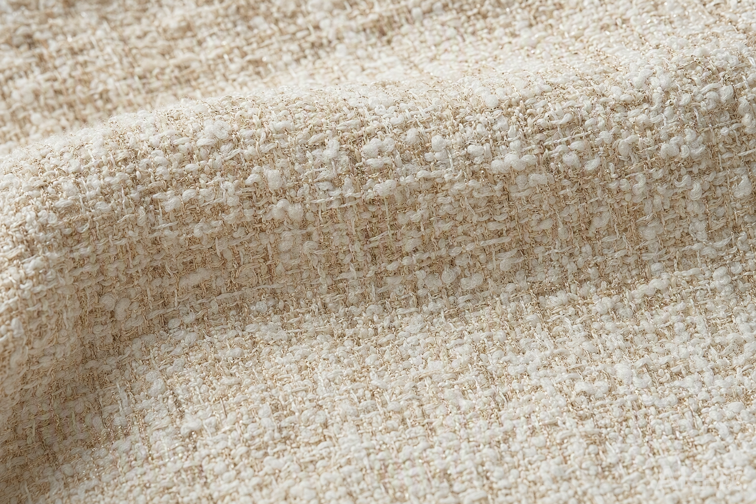 Boucle tweed fabric surface showing distinctive looped texture with raised nubs in cream and beige colors