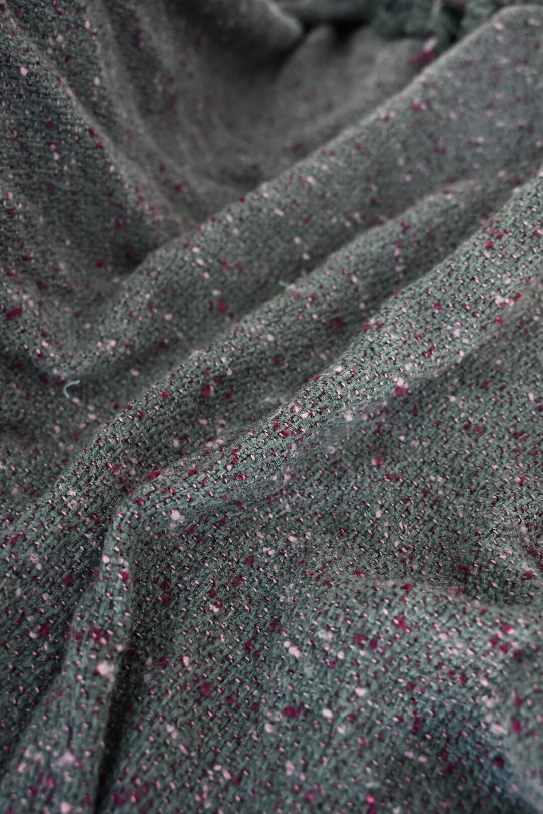 Blended knit fabric roll showing loop structure with stretch yarns